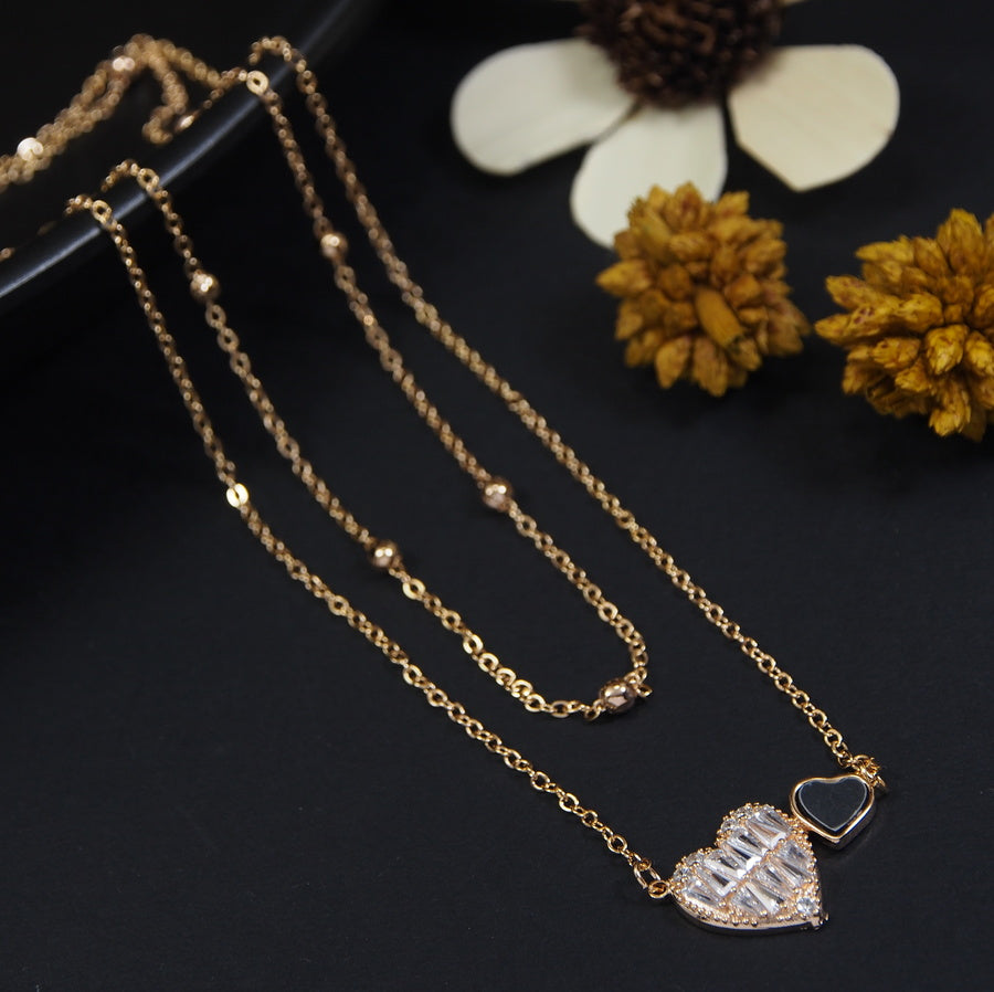 Gold/Rosegold Plated Multi Layered Cubic Zicron Baguette Filled Heart Shaped Pendent Necklace- NK 4273
